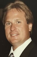 John  B.  Glodzik